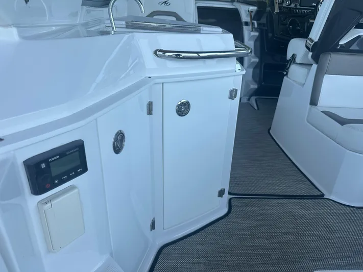 Always Flo&rsquo;n Yacht Photos Pics 2019 Monterey 295 Sport Yacht interior with sleek cabinetry and modern controls.