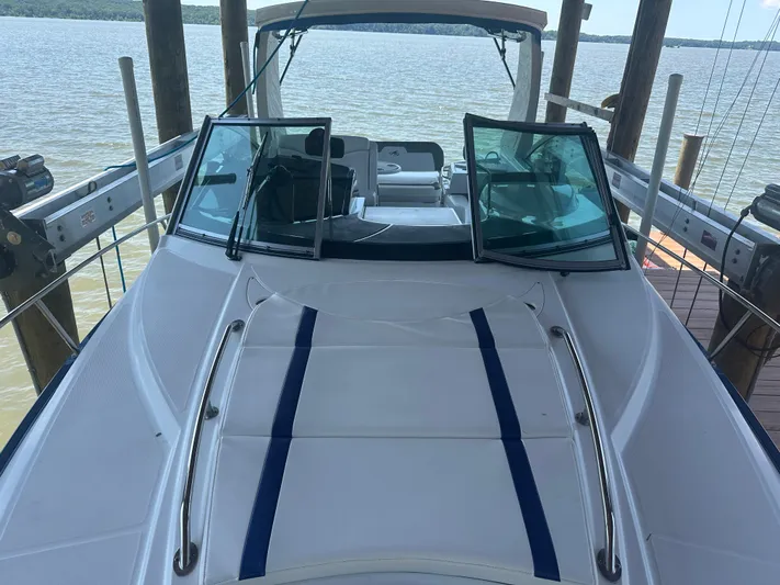 Always Flo&rsquo;n Yacht Photos Pics 2019 Monterey 295 Sport Yacht docked, showcasing sleek design and spacious deck.