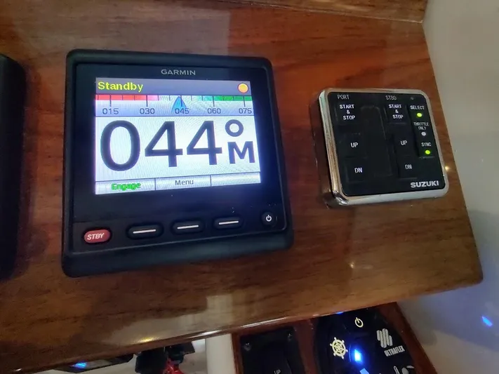 Singularity Yacht Photos Pics Garmin marine display and Suzuki control panel on 2022 True North 34 boat.