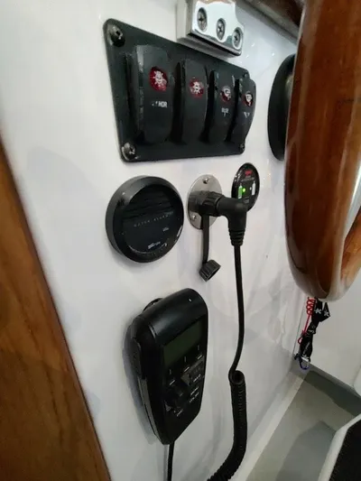 Singularity Yacht Photos Pics Control panel of a 2022 True North 34 boat with switches and gauges.