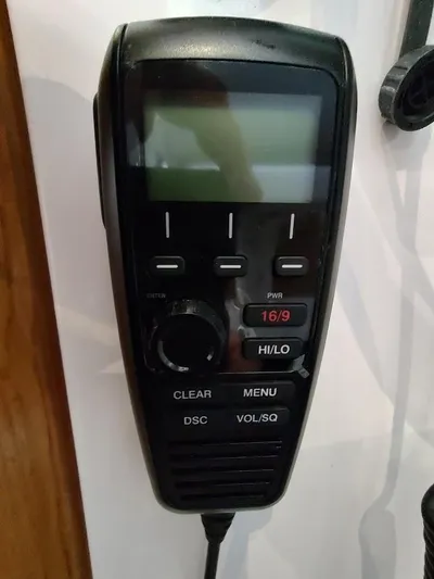 Singularity Yacht Photos Pics Handheld radio device with buttons and display, True North 34 model, 2022.