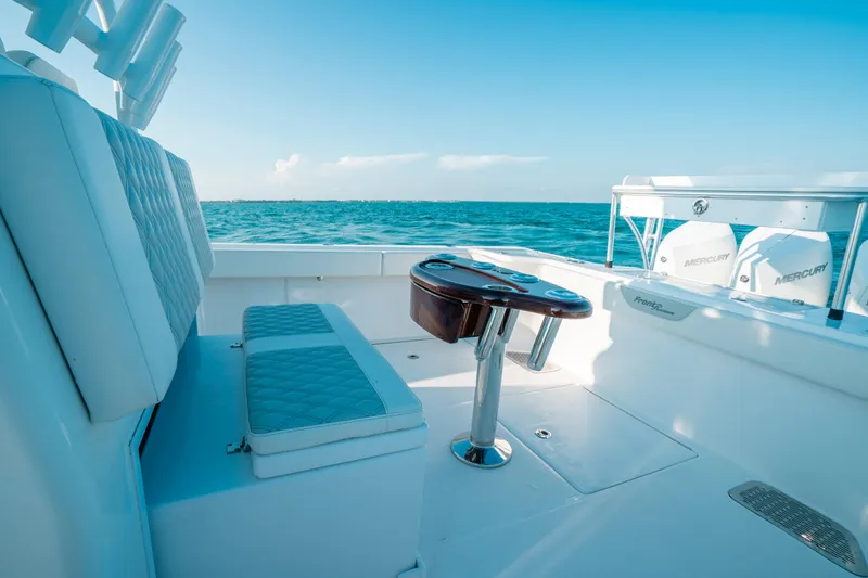  Yacht Photos Pics 2023 Front Runner 39 Center Console boat interior with seating and ocean view.