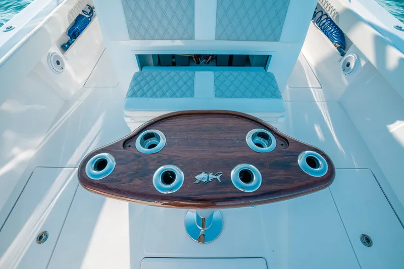  Yacht Photos Pics 2023 Front Runner 39 Center Console boat with a stylish wooden fishing rod holder.