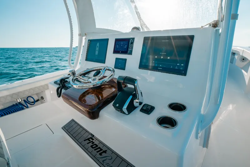  Yacht Photos Pics 2023 Front Runner 39 Center Console boat dashboard with modern navigation screens.