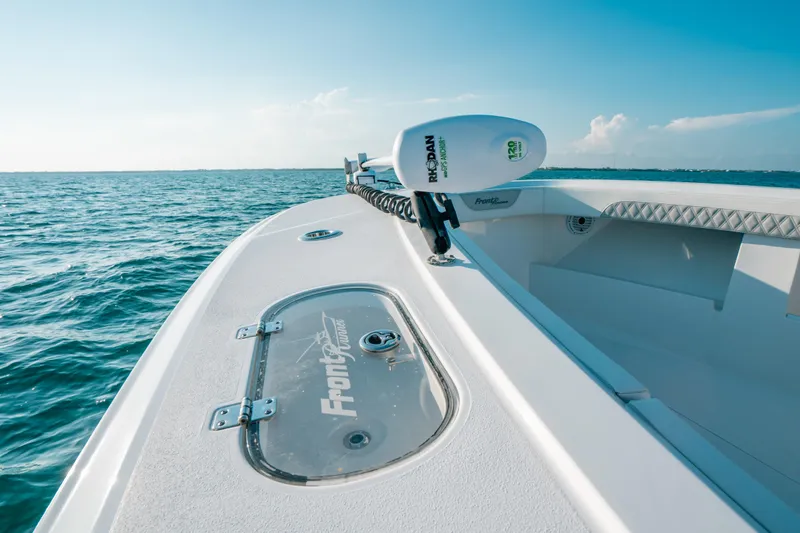  Yacht Photos Pics 2023 Front Runner 39 Center Console boat on open water, clear sky.