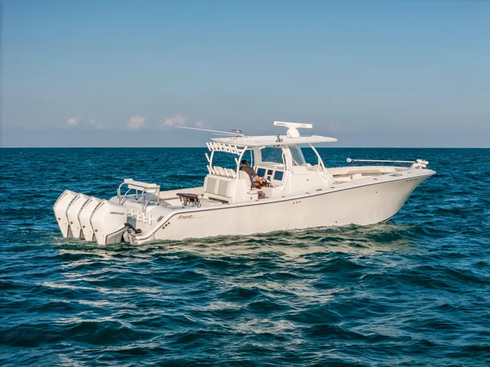  Yacht Photos Pics 2023 Front Runner 39 Center Console boat cruising on open water.