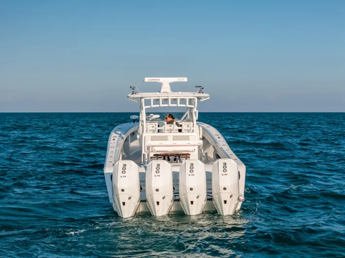  Yacht Photos Pics 2023 Front Runner 39 Center Console boat with four engines on open sea.