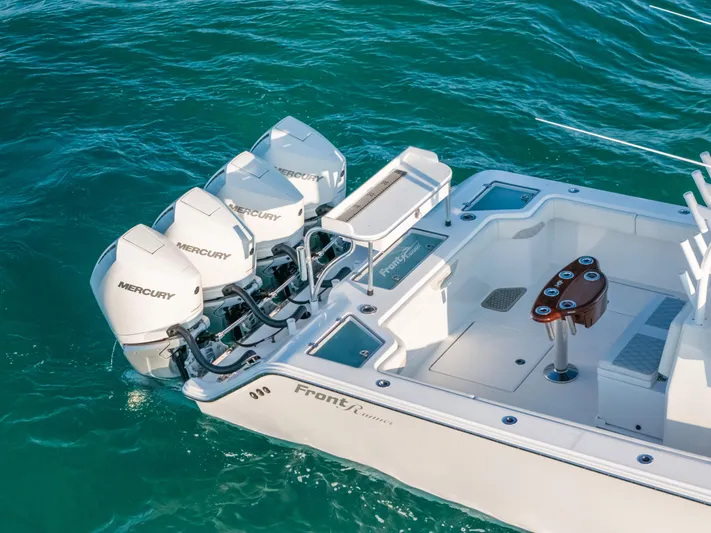  Yacht Photos Pics 2023 Front Runner 39 Center Console boat with triple Mercury engines on blue water.