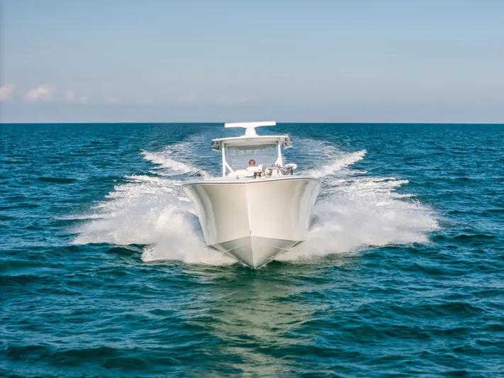  Yacht Photos Pics 2023 Front Runner 39 Center Console boat cruising on open ocean waters.