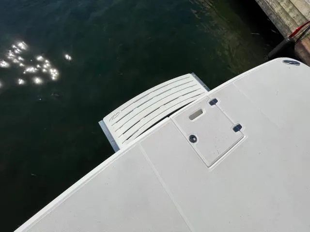  Yacht Photos Pics 2016 Regal 3200 Bowrider swim platform by the water.