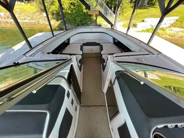  Yacht Photos Pics 2016 Regal 3200 Bowrider interior view with seating and open deck.
