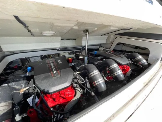  Yacht Photos Pics Engine compartment of a 2016 Regal 3200 Bowrider boat, showcasing dual engines.