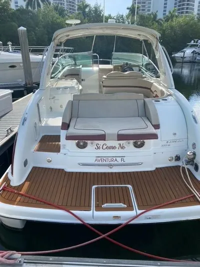  Yacht Photos Pics 2010 Formula 350 Sun Sport boat docked in Aventura, FL, with teak deck and seating area.