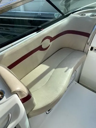  Yacht Photos Pics 2010 Formula 350 Sun Sport boat interior with beige and maroon seating.