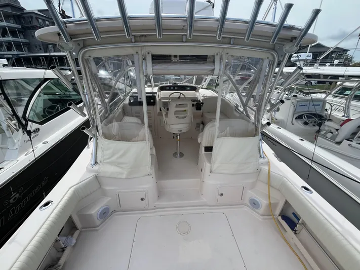  Yacht Photos Pics 2009 Grady-White Express 330 boat interior with helm and seating area.