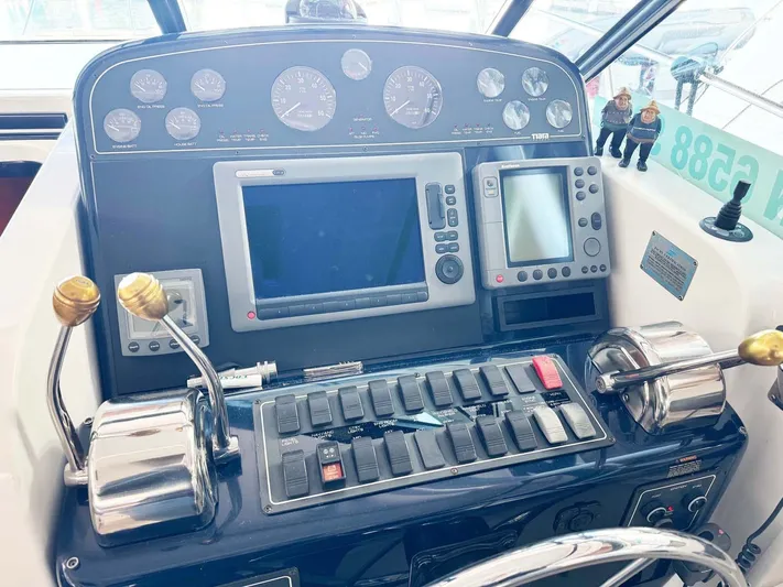 Rhumb Line Yacht Photos Pics Tiara Sport 3500 Open 2000 dashboard with navigation controls and gauges.