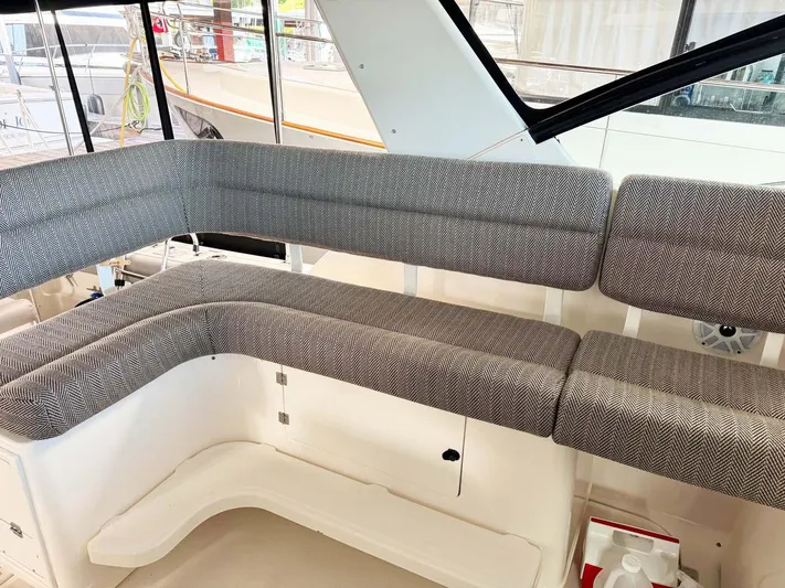 Rhumb Line Yacht Photos Pics 2000 Tiara Sport 3500 Open boat interior with cushioned seating area.