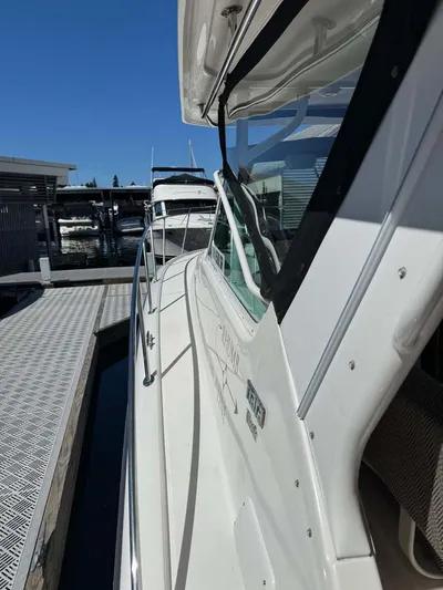 Rhumb Line Yacht Photos Pics 2000 Tiara Sport 3500 Open yacht docked at marina under clear blue sky.