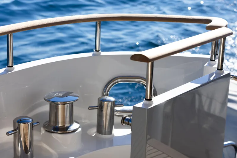 Archipelago Yacht Photos Pics Moonen 2005 Displacement Yacht deck with polished metal fittings and ocean view.