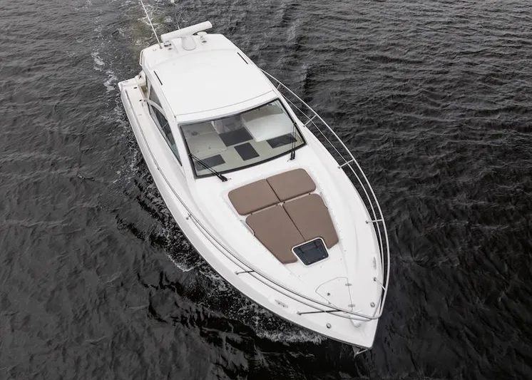Scrappy G Yacht Photos Pics 2015 Pursuit SC 365i Sport Coupe cruising on open water.