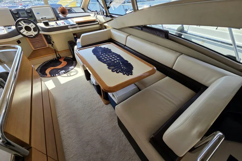  Yacht Photos Pics Luxurious interior of 2012 Azimut Fly 60 yacht with elegant seating and helm station.