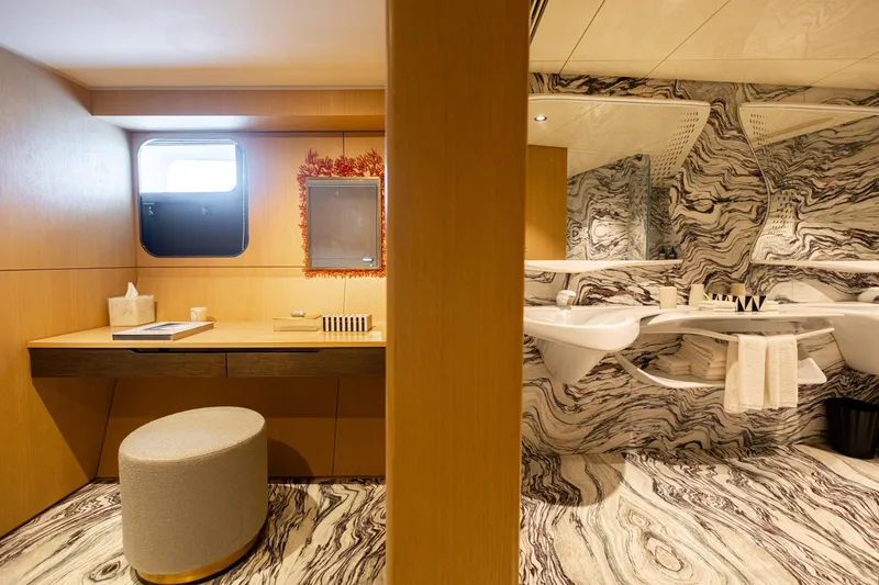 Grand Cru Yacht Photos Pics Luxurious yacht interior with marble bathroom and wooden vanity, Baglietto 49M, 1995 model.