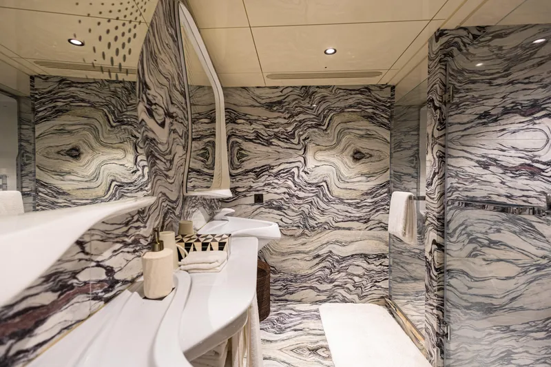 Grand Cru Yacht Photos Pics Luxurious marble bathroom interior on a 1995 Baglietto 49M yacht.