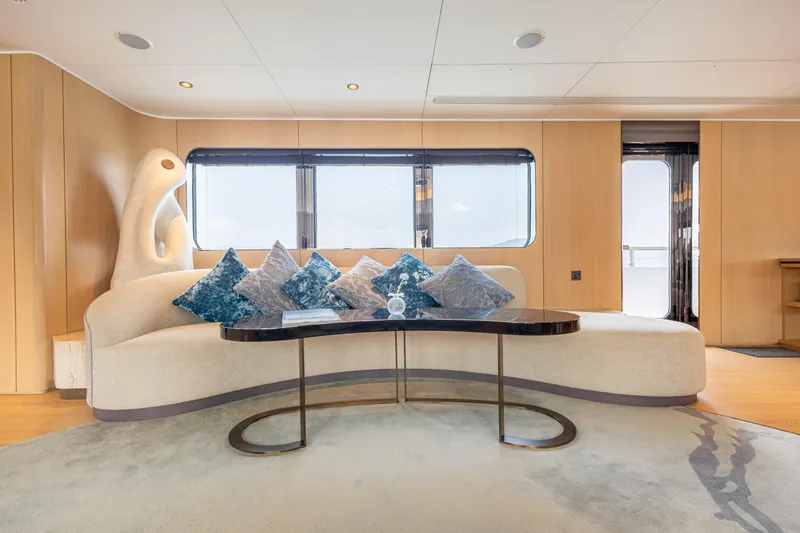 Grand Cru Yacht Photos Pics Luxurious interior of 1995 Baglietto 49M yacht with elegant seating and modern decor.