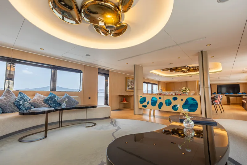 Grand Cru Yacht Photos Pics Luxurious interior of 1995 Baglietto 49M yacht with modern decor and elegant furnishings.