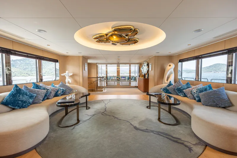 Grand Cru Yacht Photos Pics Luxurious interior of 1995 Baglietto 49M yacht with elegant seating and modern decor.