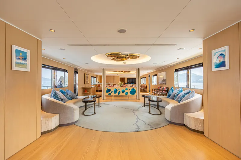 Grand Cru Yacht Photos Pics Luxurious interior of 1995 Baglietto 49M yacht with elegant seating and modern decor.