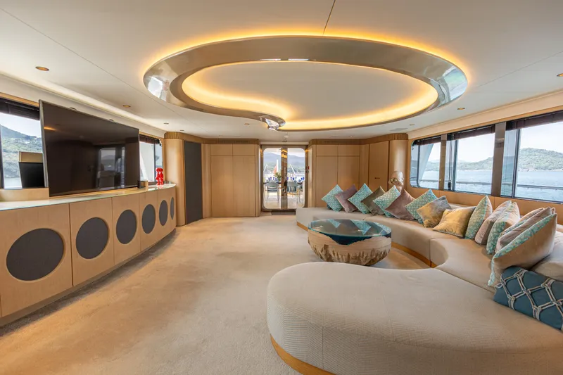 Grand Cru Yacht Photos Pics Luxurious interior of 1995 Baglietto 49M yacht with modern decor and large windows.