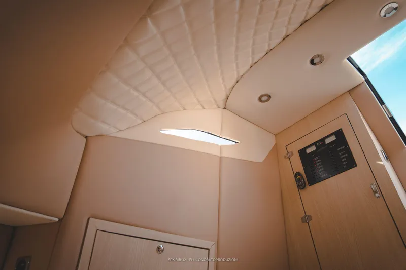 Yacht Photos Pics Interior cabin of 2025 SPX RIB 32 Sport boat with modern design and skylight.