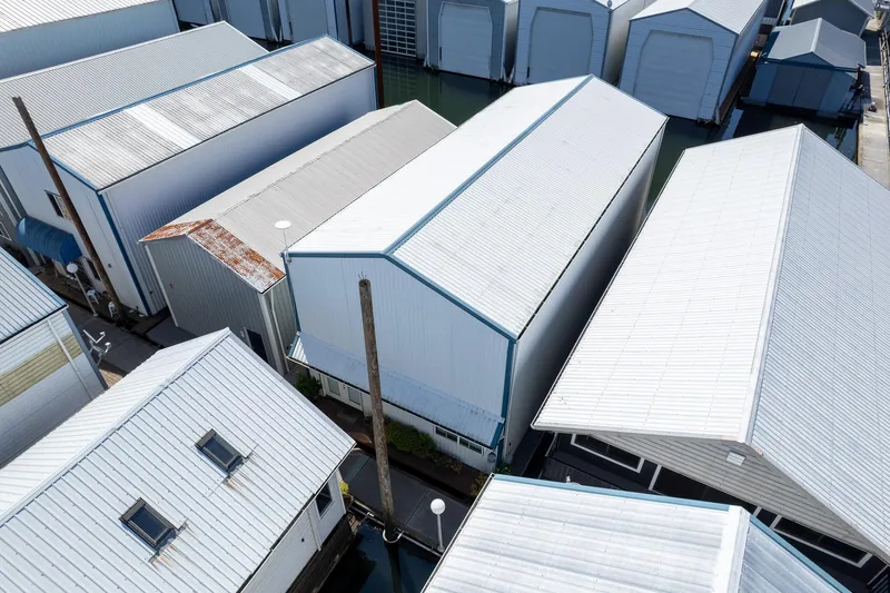  Yacht Photos Pics Aerial view of Steelhead Boathouse, 2006, featuring multiple white-roofed structures.