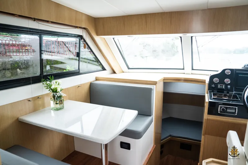  Yacht Photos Pics Interior of 2025 Bracewell Commander 36SF yacht with modern seating and helm.