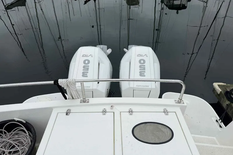  Yacht Photos Pics 2025 Bracewell Commander 36SF with twin Mercury 350 engines at dock.