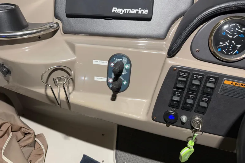 Allegedly Yacht Photos Pics Control panel of a 2000 Carver 396 Motor Yacht with Raymarine display and switches.