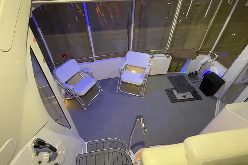 Allegedly Yacht Photos Pics Interior of 2000 Carver 396 Motor Yacht with seating and nautical decor.