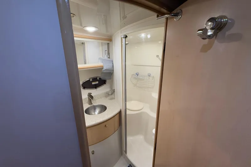 Allegedly Yacht Photos Pics Bathroom interior of 2000 Carver 396 Motor Yacht with shower and sink.