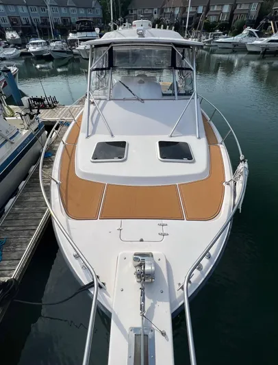  Yacht Photos Pics 2003 Grady-White Express 330 boat docked in a marina.