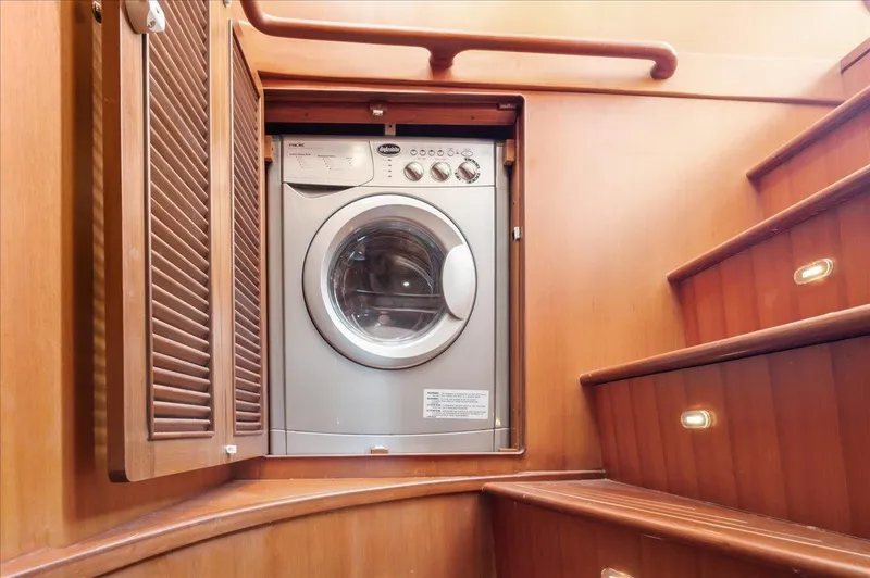  Yacht Photos Pics Washing machine in wooden cabinet on Selene 53 yacht, 2003 model.
