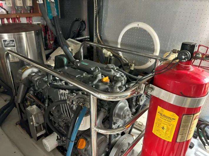  Yacht Photos Pics Engine room of a 2003 Selene 53 yacht with visible fire extinguisher.