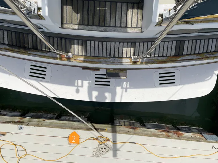  Yacht Photos Pics Top view of 1987 Grand Banks 42 Motoryacht docked, showing deck and railing details.