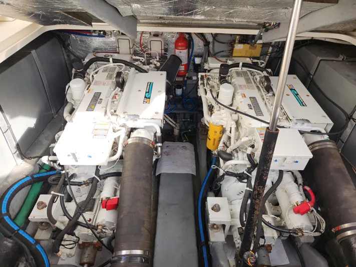  Yacht Photos Pics Engine room of a 2001 Sea Ray 410 Express Cruiser with dual engines and equipment.