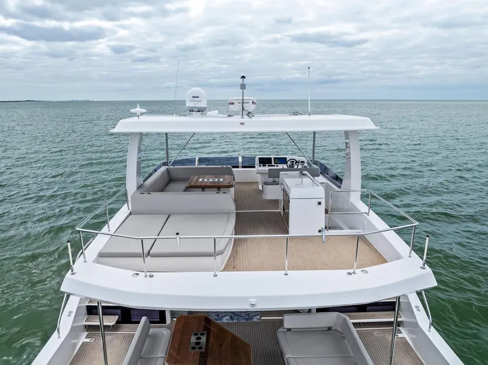 53 Powercat Yacht Photos Pics 2021 Leopard 53 Powercat yacht on open water, featuring spacious deck and seating area.