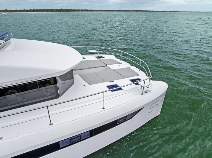 53 Powercat Yacht Photos Pics 2021 Leopard 53 Powercat cruising on calm green waters.