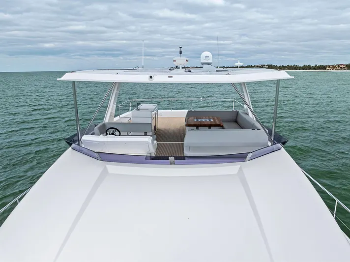 53 Powercat Yacht Photos Pics 2021 Leopard 53 Powercat yacht on open water, featuring spacious deck and seating area.