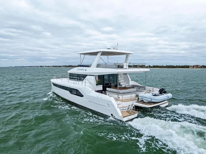 53 Powercat Yacht Photos Pics 2021 Leopard 53 Powercat cruising on open water, showcasing sleek design and spacious deck.
