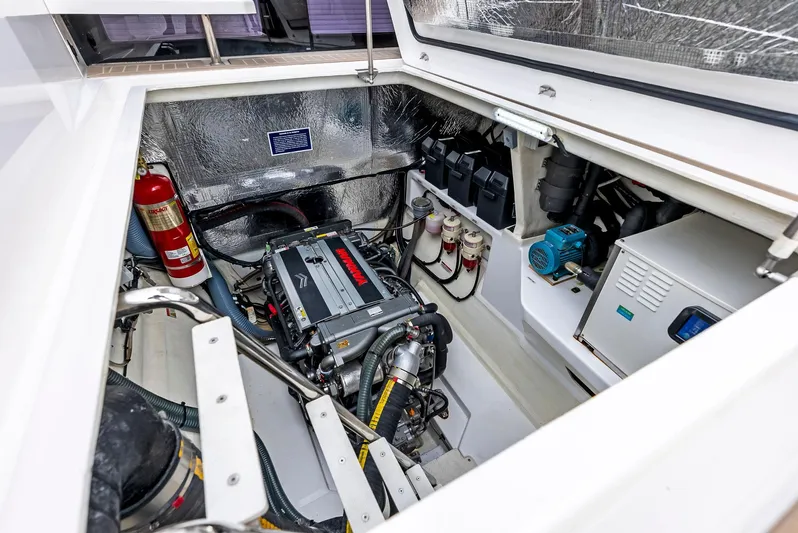 53 Powercat Yacht Photos Pics Engine compartment of 2021 Leopard 53 Powercat with fire extinguisher and electrical components.
