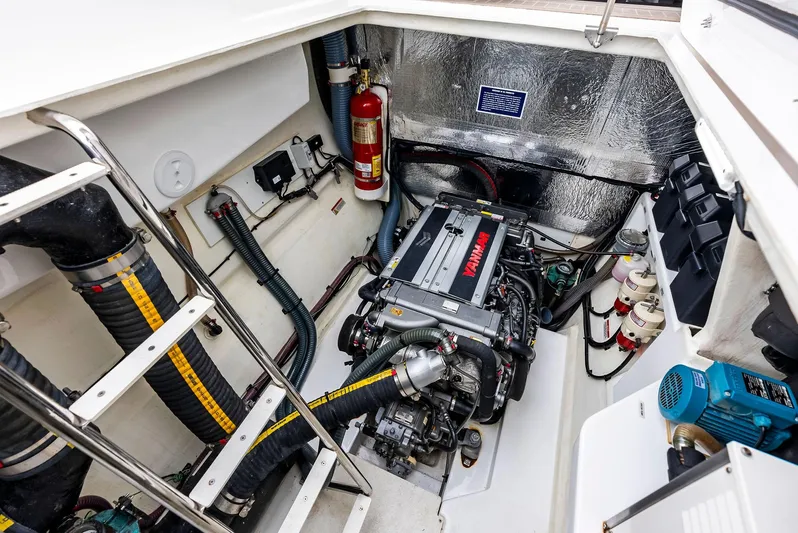 53 Powercat Yacht Photos Pics Engine room of 2021 Leopard 53 Powercat with Yanmar engine and fire extinguisher.